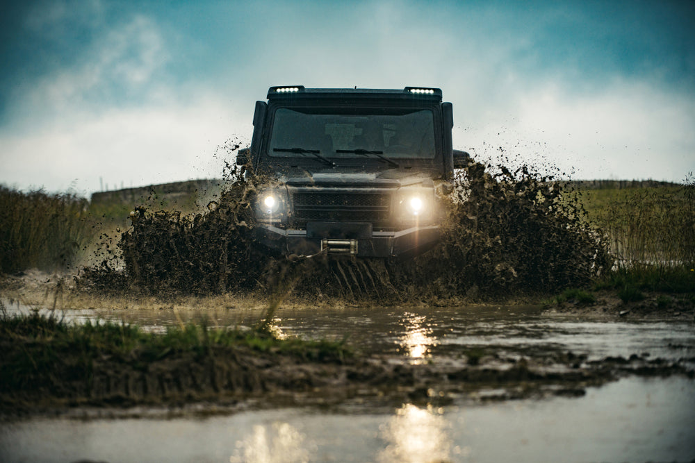 4WD driving through muddy water